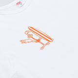 TSPTR PRAY FOR SURF T-Shirt. White shirt with the words Pray For Surf on it in orange letters on the back. Roadrunner holding a surfboard is on the front. 