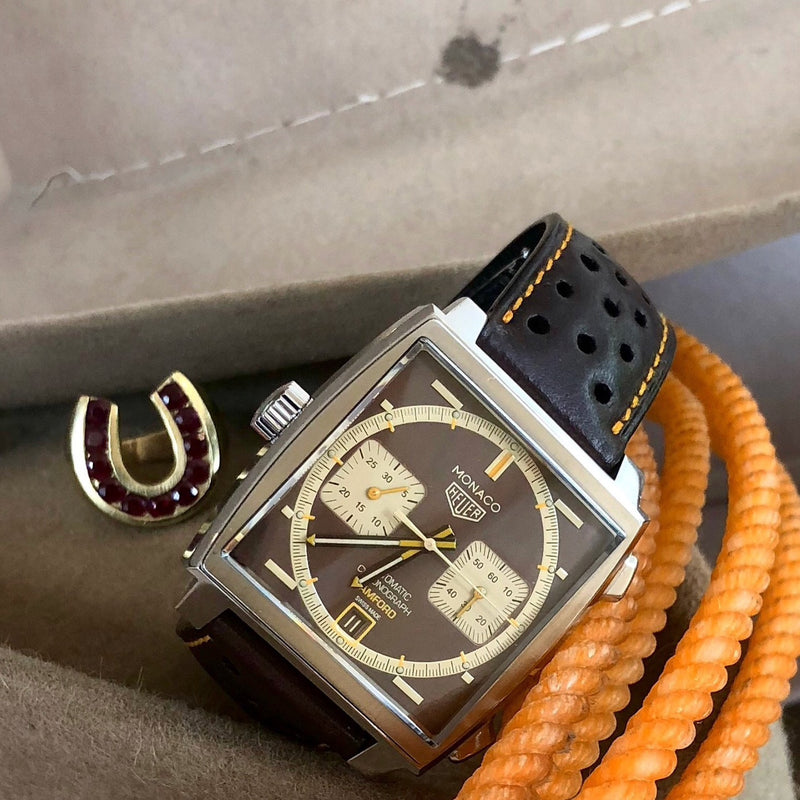 The Monaco, based on the iconic designed racing watch that was the world’s first square cased water resistant automatic chronograph.  CASE MATERIAL: Stainless Steel finished available with Military Grade Titanium Coating (MGTC) CASE DIAMETER: 39 x 39 mm CASE THICKNESS: 14.7 mm CRYSTAL: Sapphire crystal