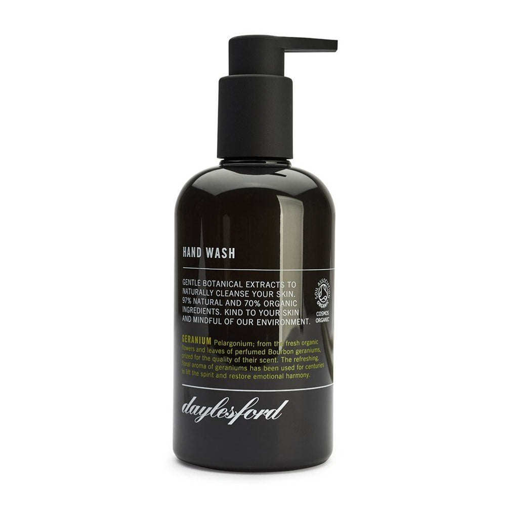 Daylesford organic hand wash. Black bottle and black push down pump lid. Nourishing botanical extracts to soften and soothe your hands 99% natural and 85% organic ingredients. geranium scent. 
