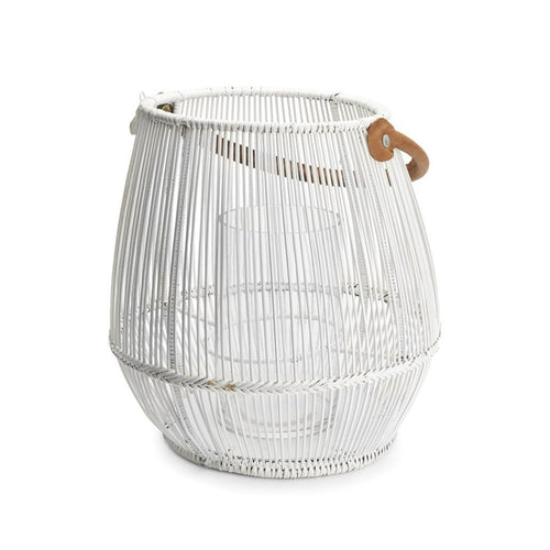 Daylesford cove lantern. The outside is a wood string pattern with a wooden handle. On the inside there is a glass holder for the candle. 