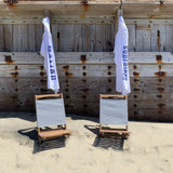 One Gun Ranch Kids Hooded Beach Towels. White terry cloth with Surfrider and Malibu printed in blue text down the side. 
