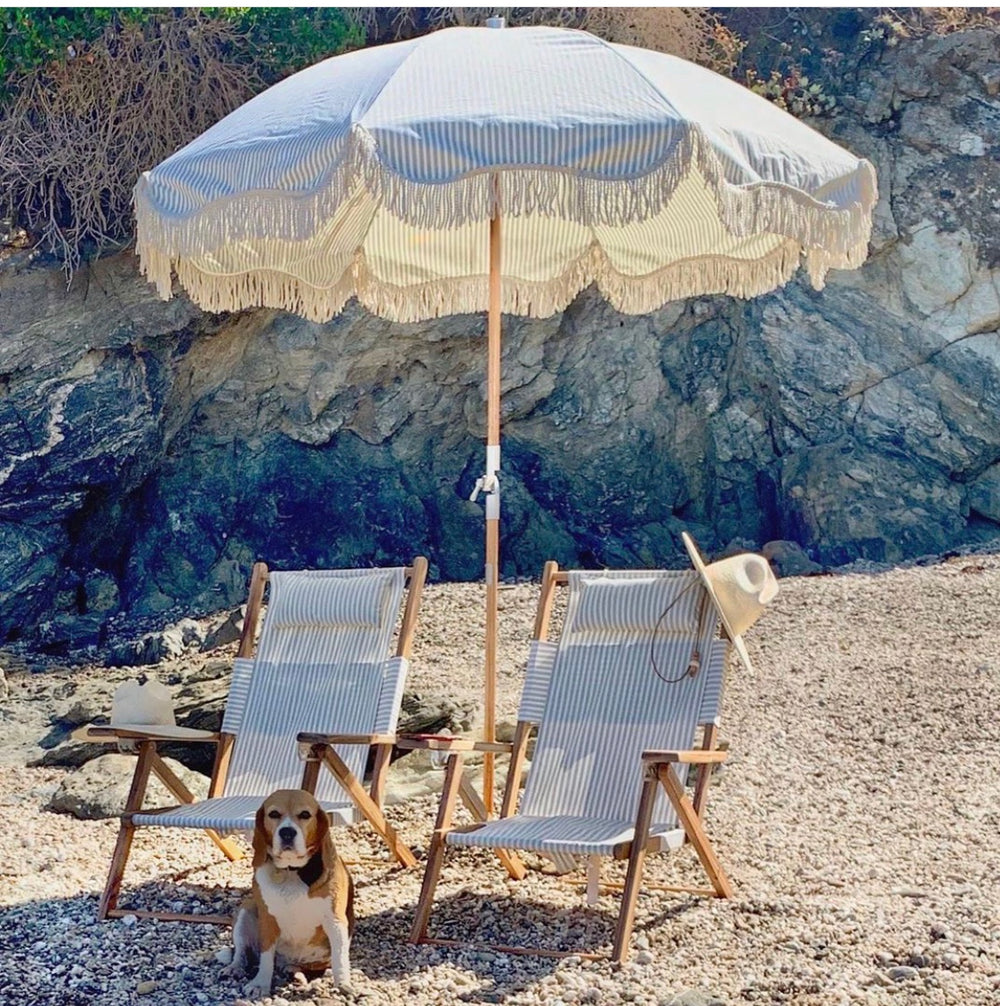 The Premium Beach Umbrella. Large 6' Span. Printed polyester/cotton canvas with UV , mold & water resistant treatment. World forestries certified, reclaimed timber wood pole with chestnut finish. Natural cotton fringe & internal trim. Canvas carry bag in same print design.