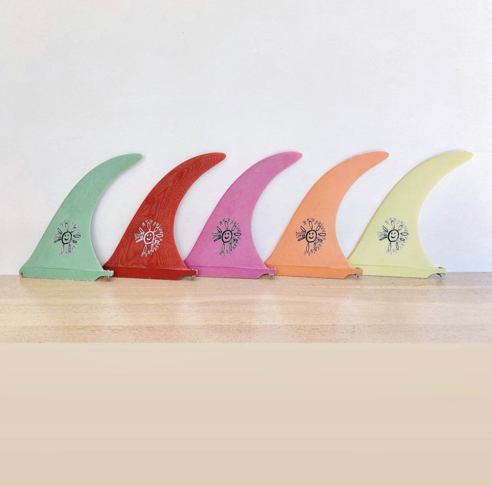Captain fin alex knost fin. They come in green, red, pink, orange and yellow. They have a smiley face flower on the side. 
