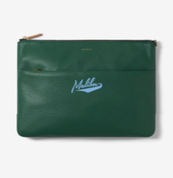 Chaos leather clutch with two zipper pockets. The word Malibu is written in blue cursive text in the center. 
