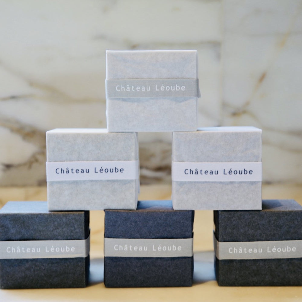 Chateau Leoube Soap wrapped in a white and black paper. 