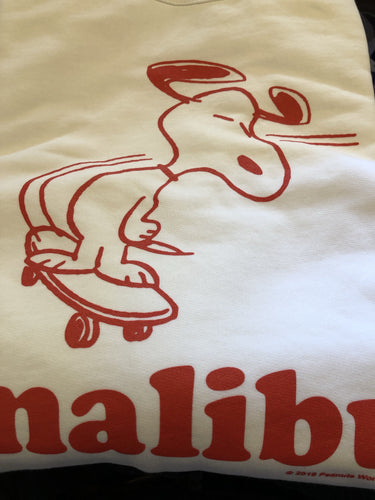 TSPTR Malibu Skate Pullover. White shirt with a red design of Snoopy riding a skateboard on the front. 