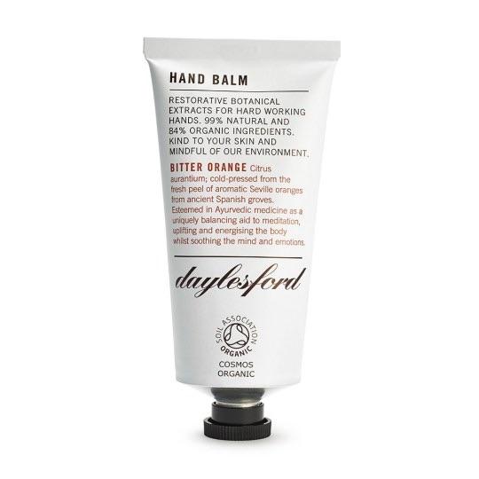 Daylesford organic hand balm. Bitter orange scent. Restorative botanical extracts for hard working hands. 99% natural and 84% organic ingredients.