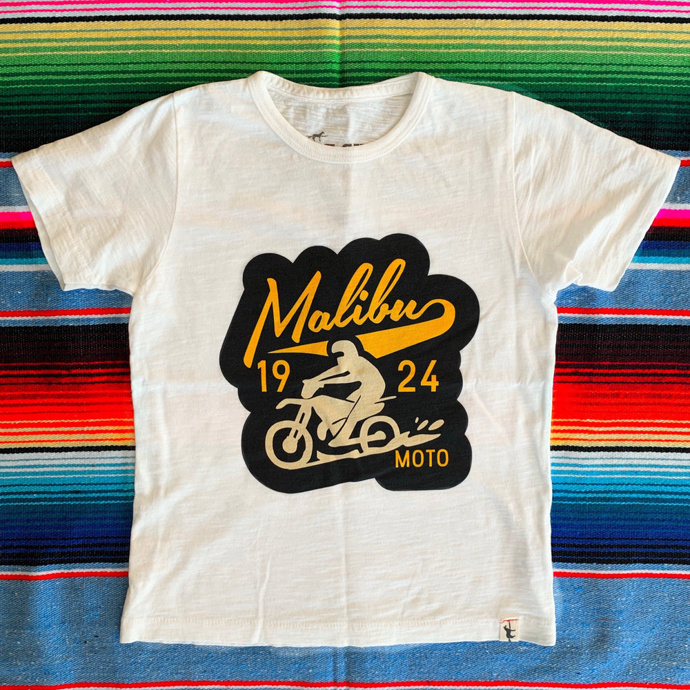One Gun Malibu Moto Kids T-Shirts. White shirt with a black and yellow moto design 