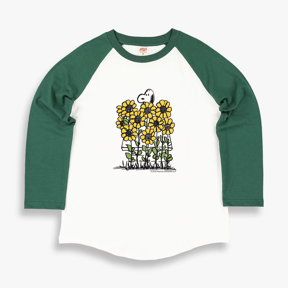 TSPTR Sunflowers Raglan T-Shirt. White shirt with green sleeves. It has a design of Snoopy in a field of tall sunflowers.  Edit alt text