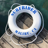 White lifesaver with the words Surfrider Malibu, CA in blue around it. 