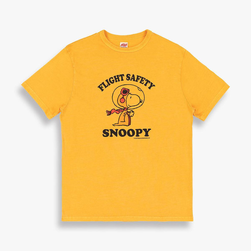 TSPTR Snoopy Flight Safety T-shirt. A yellow shirt with a design of Snoopy in a space suit. Around him says Flight Safety Snoopy. 
